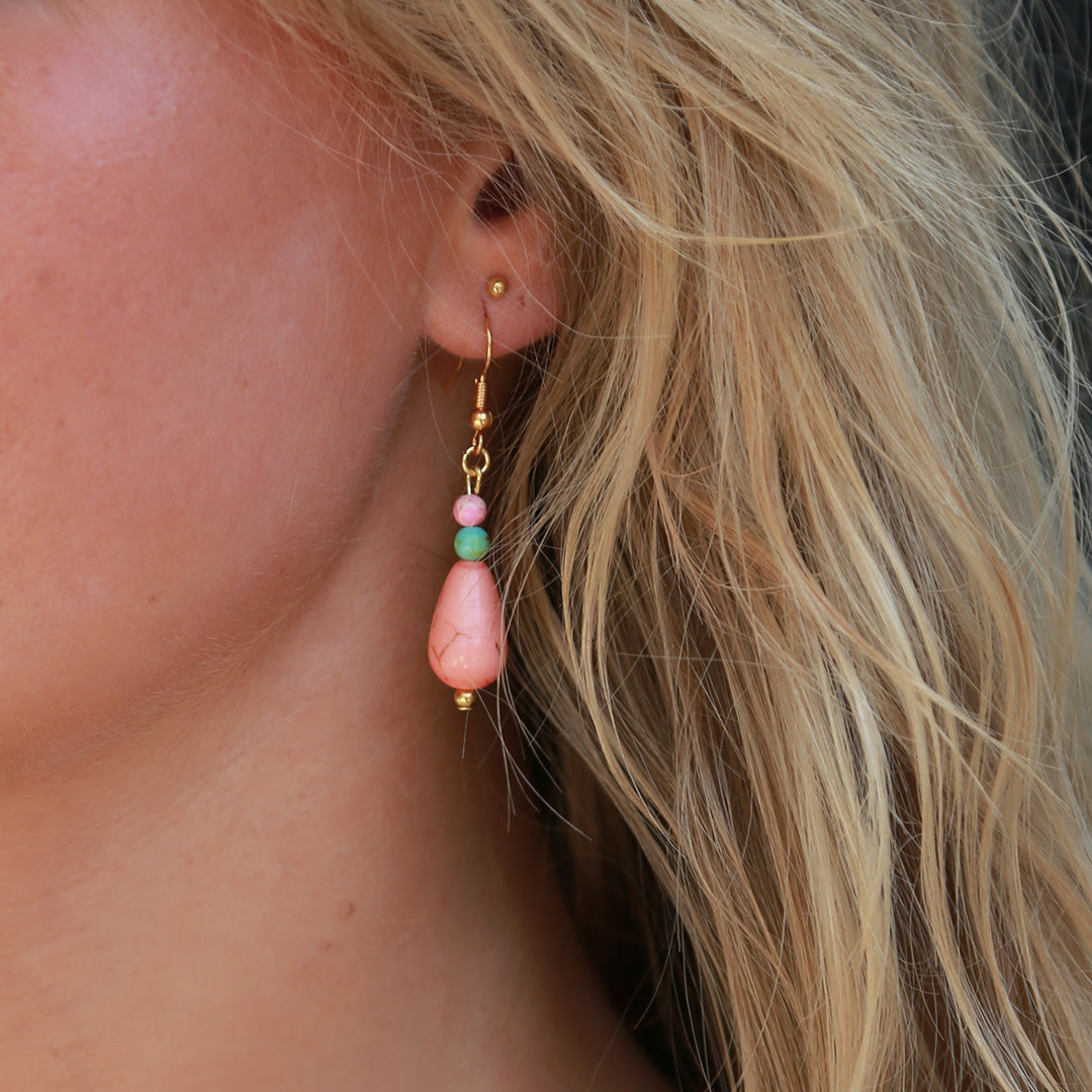 des boucles d'oreilles peach drop