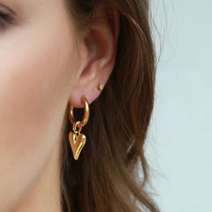 Gold earrings beat of my heart