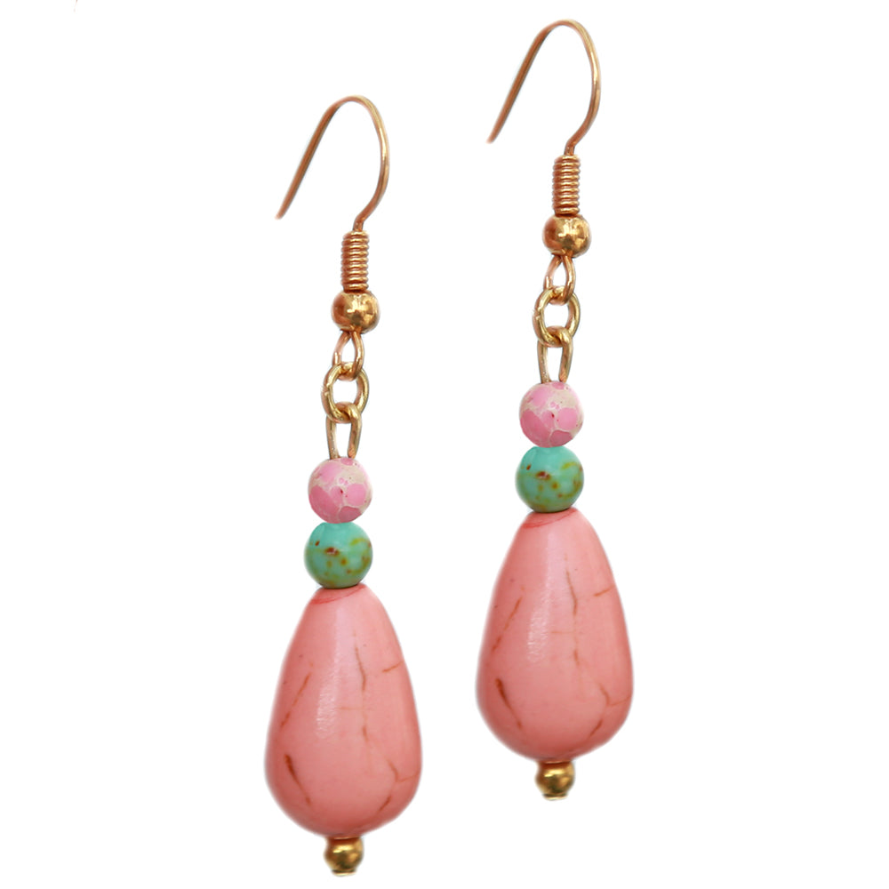 des boucles d'oreilles peach drop