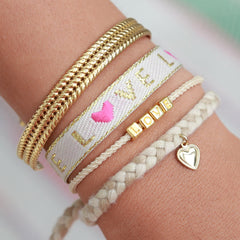 Le bracelet love doré beige