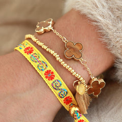 Bracelet tissé fleur jaune