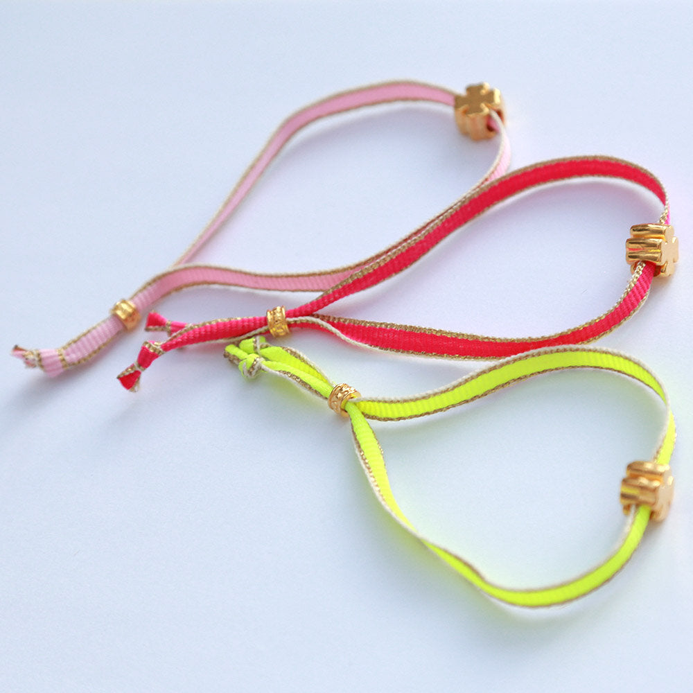 Armband golden clover hot pink